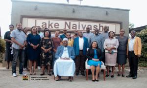 Secretary to the Cabinet, Mercy Wanjau (seated right) and Principal Secretary for Cabinet Affairs Dr. Idris Salim Dokota join staff from the two offices in a group photograph during a working retreat in Naivasha